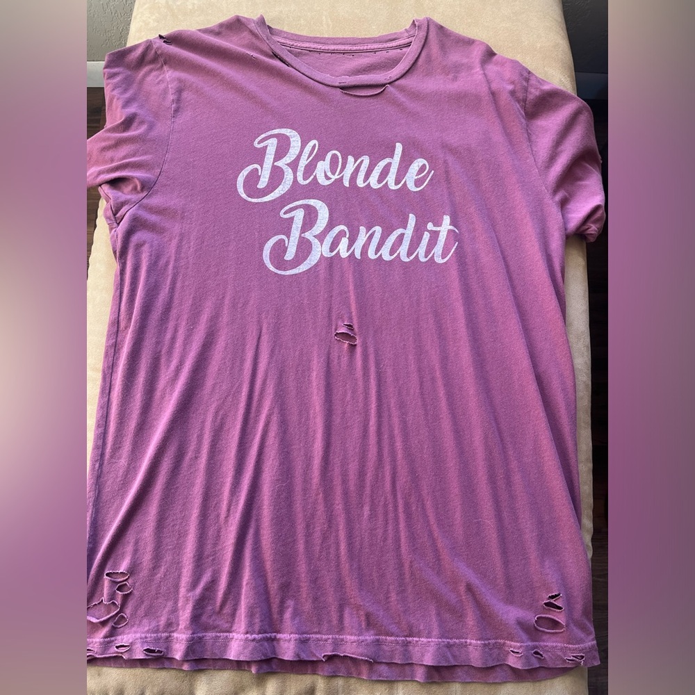 Distressed Mauve/distressed purple graphic tee from a boutique